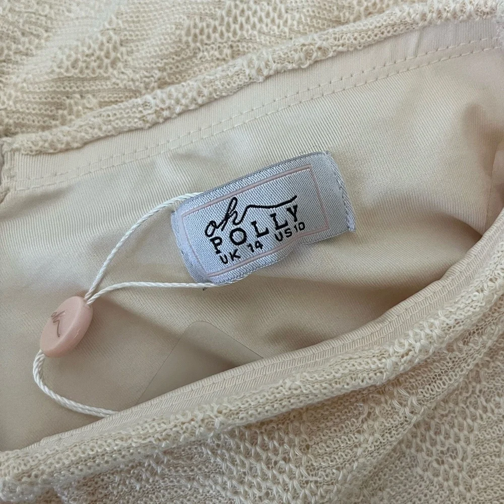 NWT OH POLLY | Zuni Lace Up Back High Waisted Flare Trousers in Cream | Size 10